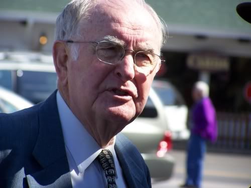 Bob Carpenter, retired NC Senator is involved in conversation while awaiting the arrival of Senator Elizabeth Dole