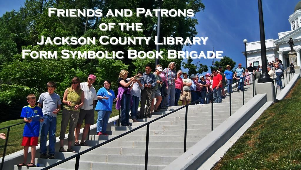 A symbolic book brigade moves the last of the book from the old library to the new library in Sylva, NC on Saturday, May 21, 2011