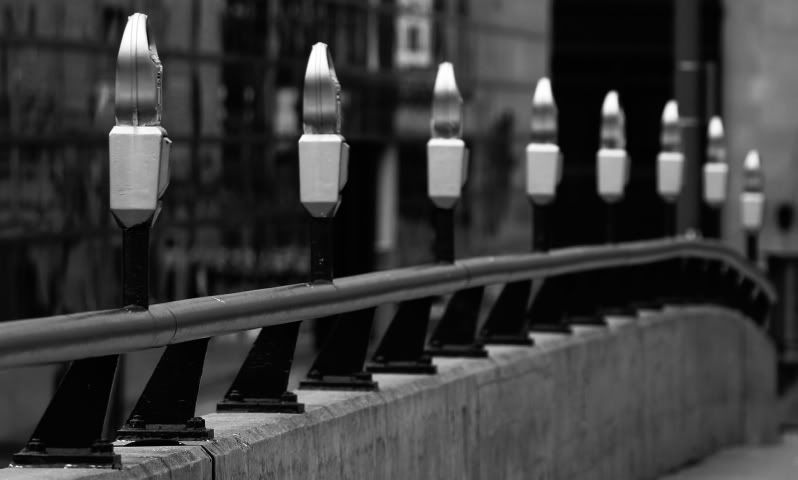 IMAGE: http://i106.photobucket.com/albums/m269/drkrvnchld/rowofmeters-BnWresize.jpg