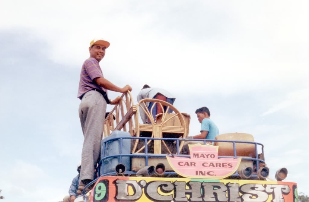 Armando helping load Jeepney roof