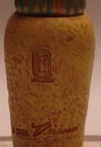 S-006B (Store, artifact 6, back view, close up):  Mini Canopic Jar Set