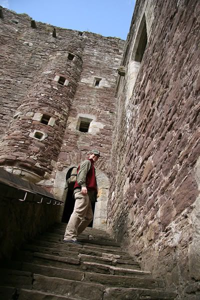 Mark Bussler standing on stairs at Doune Castle used in the filming of Monty Python and The Holy Grail